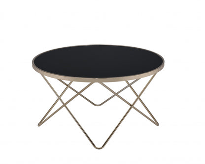 34" Black And Gold Glass And Iron Round Coffee Table