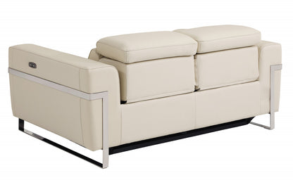 65" Beige And Silver Italian Leather Power Reclining Loveseat