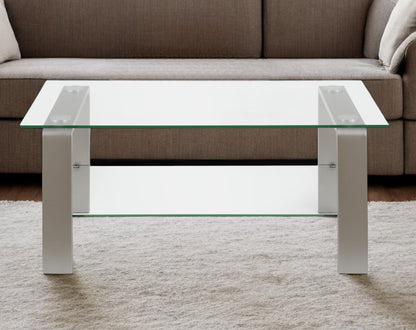 40" Clear And Silver Glass And Steel Coffee Table With Shelf